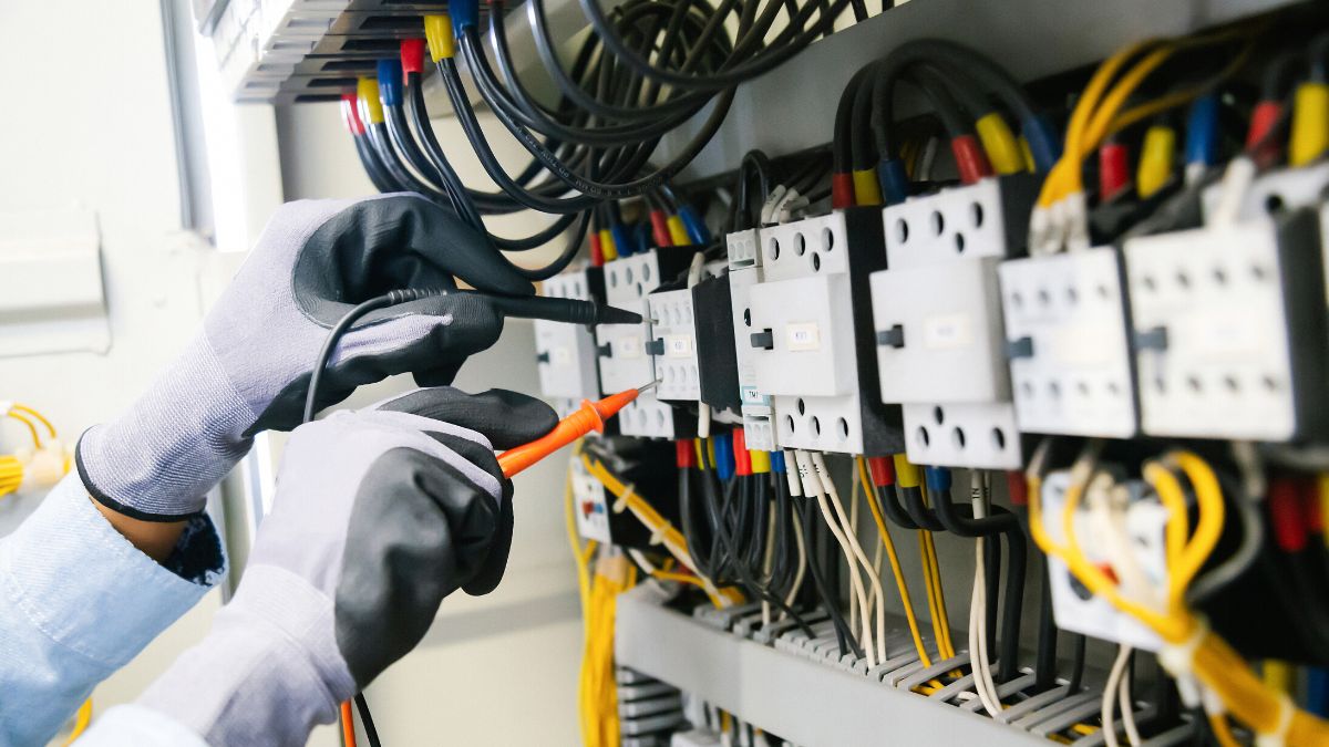 Electrician working on wires.